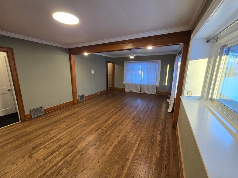 refinished hardwood floors - 1019 Widdicomb Ave NW