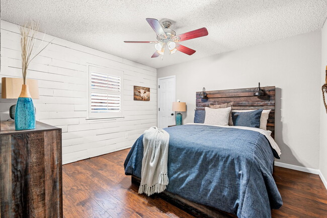 Third bedroom with Shiplap wall and oversized walk in closet! - 209 Prairie Wind Blvd