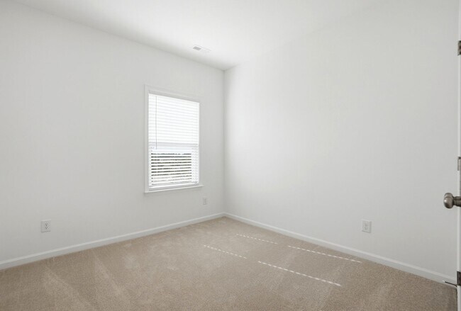 Building Photo - Brand-New Townhome in the University area at Senata at Research Park!