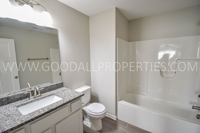 Building Photo - Summer rent special: $250 off the first two months rent! Modern Ankeny Townhome with Two Primary ...