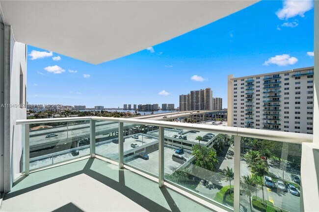 Building Photo - 19380 Collins Ave