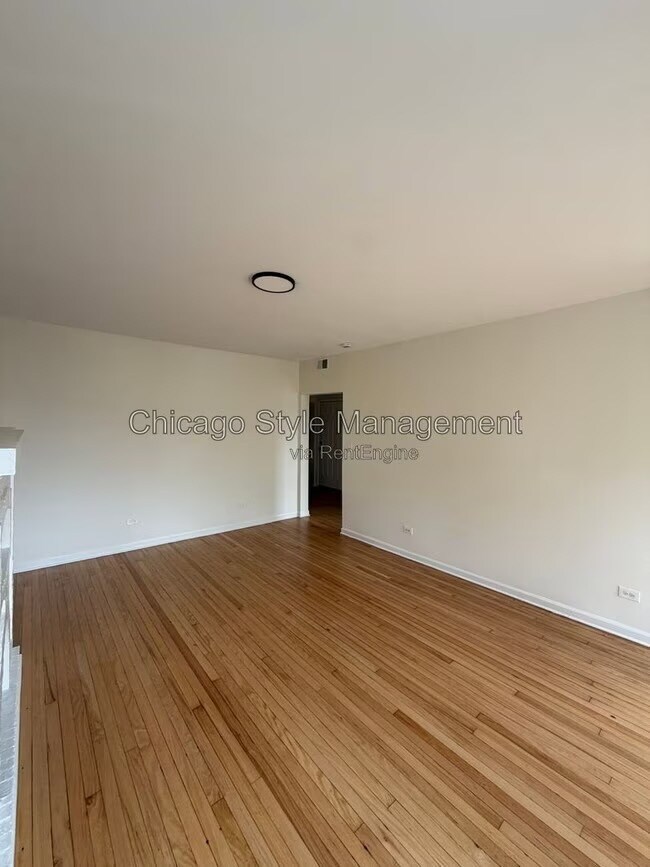 Building Photo - 7831 S Colfax Ave