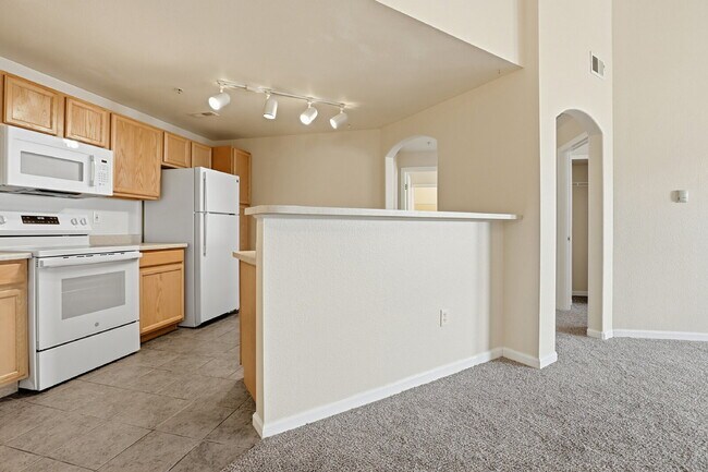Building Photo - $1,690.95, 2-bed, 2-bath condo in a gated community with a washer/dryer.