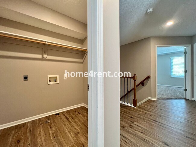 Building Photo - Updated Kitchen, Large Two Tiered Deck, Finished Basement in Blue Valley Schools!