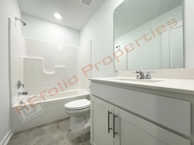 Building Photo - Brand New 3 Story, 4 bedroom, 3.5 bathroom Townhome Featuring a 1st floor Guest Suite, 2 Car Gara...