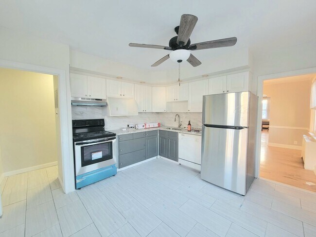 Building Photo - Stunning 4-Bedroom Townhome with Finished ...