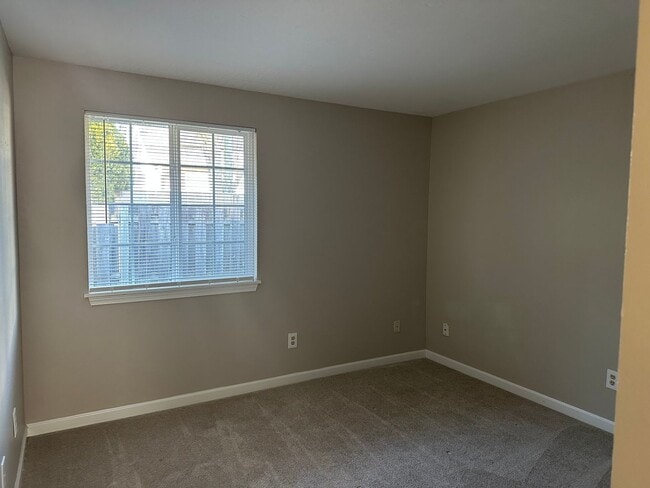 Building Photo - Spacious & Stylish 3BD Home with Iconic Stone Fireplace + Soaking Tub