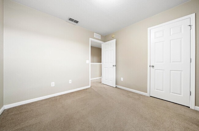 Building Photo - Corner Unit ~ Lake View ~ Maintenance Free...