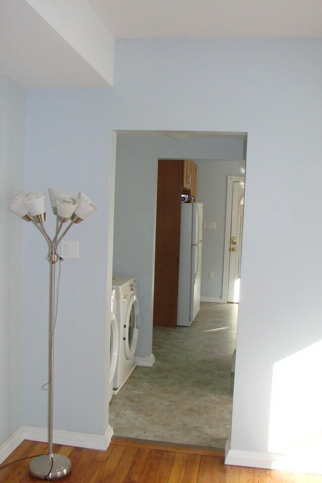 View from dining room through hallway into kitchen - 713 Orchard St