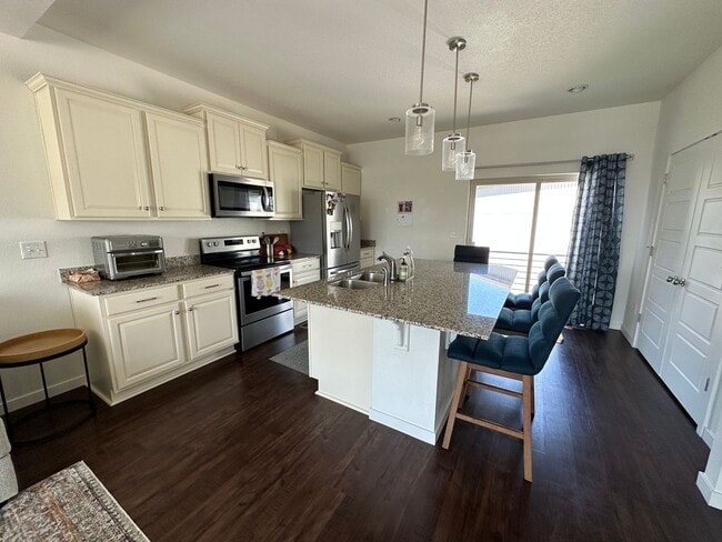 Building Photo - GORGEOUS 2 BEDROOM CARRIAGE HOME IN THE STUNNING BANNING LEWIS RANCH NEIGHBORHOOD!!!!!!