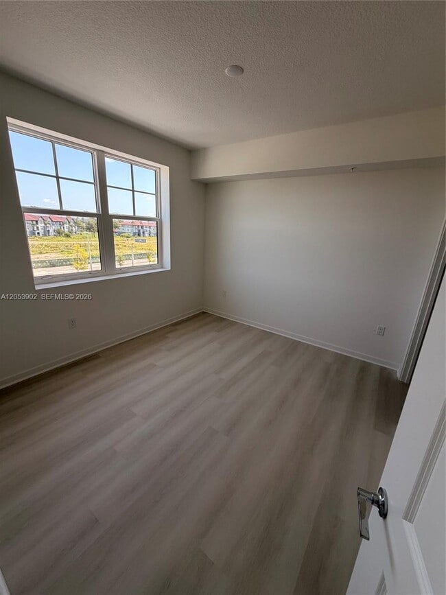 Building Photo - 5563 Millennia Park Dr