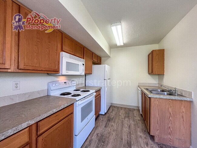 Building Photo - 5940 W Port Pl