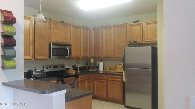 Building Photo - 8226 Green Parrot Rd