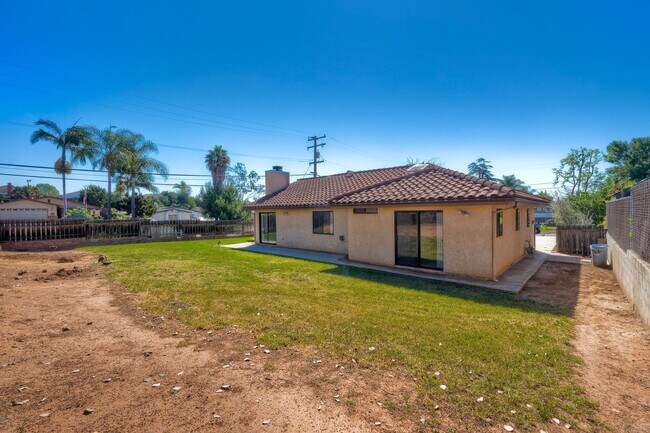 Building Photo - Corner Lot 4BR with Vaulted Ceilings & Big Yard