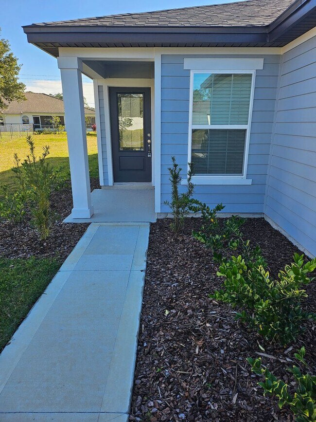 Building Photo - Great Newer Home is Palm Coast Ready for Move-In!