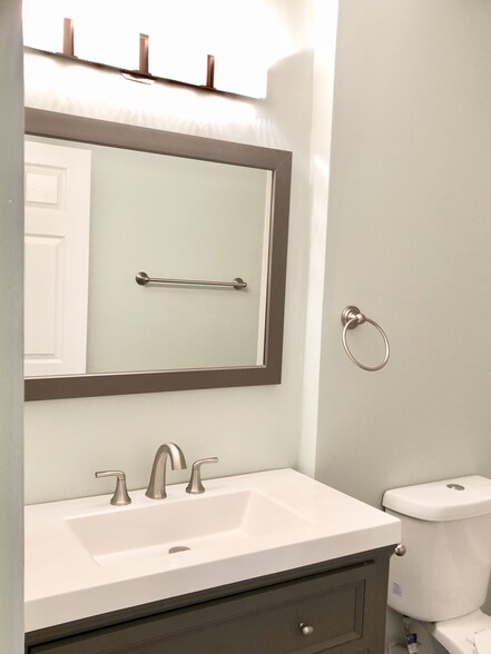 Newly remodeled bathroom with upgraded features and bathtub - 307 Fisk St