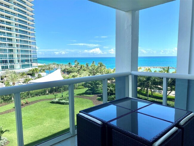 Building Photo - 10275 Collins Ave