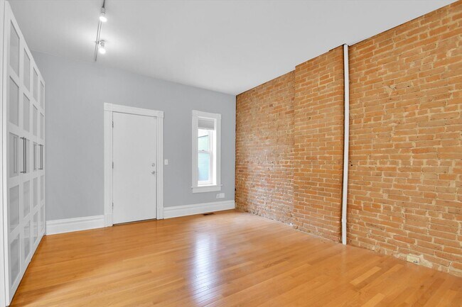 Building Photo - Architecturally Stunning Curtis Park Townhome With Historic Charm