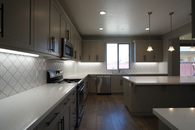 Building Photo - Available now! Beautiful Newer Home in Man...
