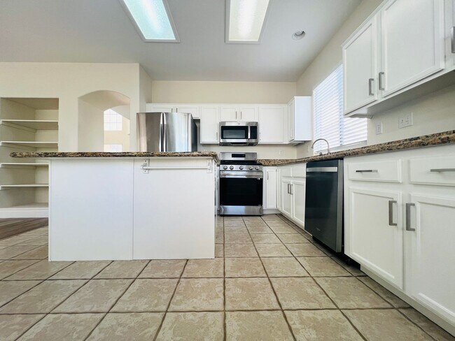 Building Photo - REMODELED, SPACIOUS, 4 BEDROOM HOME WITH VAULTED CEILINGS AND LOFT
