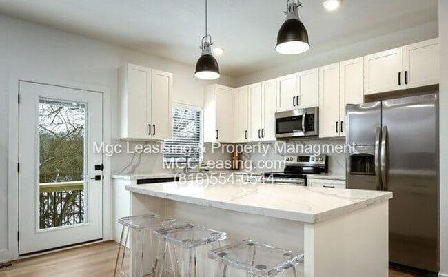 Building Photo - Ayden Place Townhomes: Move in by April 1 and receive $750 off your first month’s rent with a 15-...