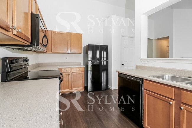 Building Photo - This adorable home is ready for your personal touch!