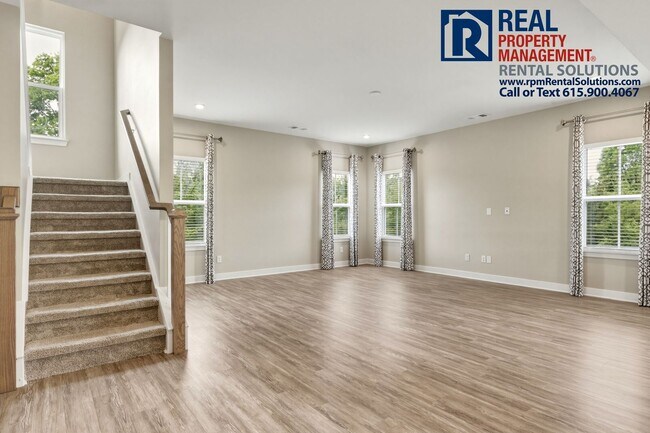 Building Photo - Great 4 bd 2.5 ba with attached garage and large deck!