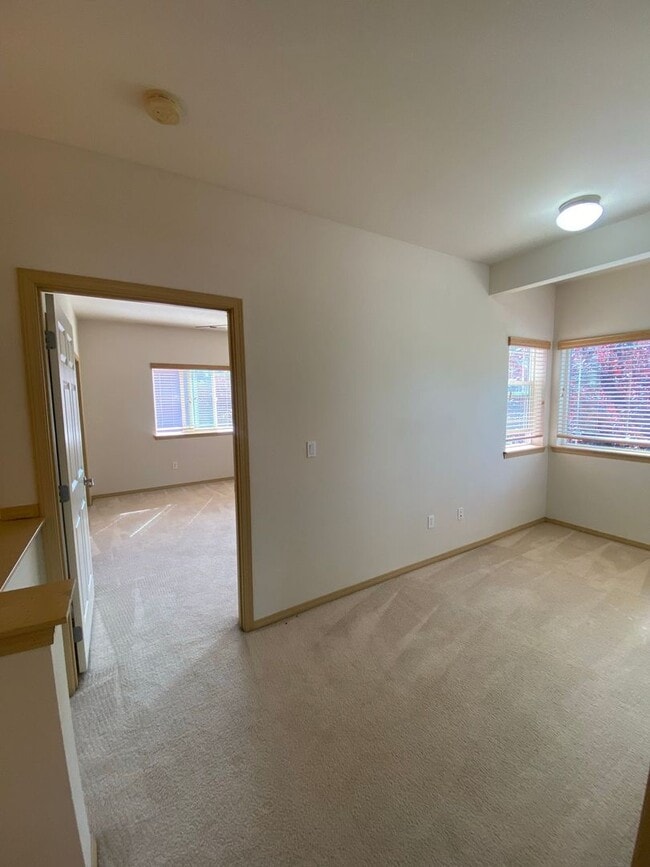Building Photo - No Mower Needed! Great Townhome In A Beaut...