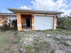 Building Photo - 3/2 Duplex in Lehigh HALF OFF THE FIRST MONTH!!!!
