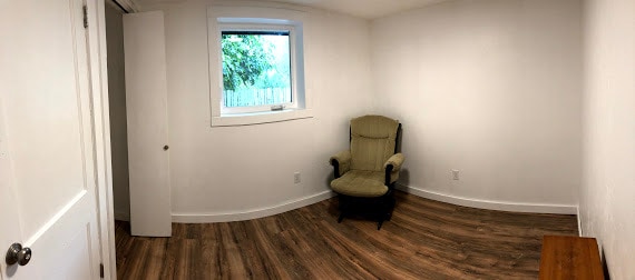 Bedroom. Closet not visible, but located on left. - 2415 E 12th St