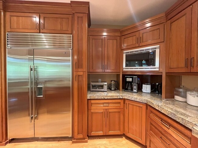 Building Photo - Forest-View Luxury Home with 5 Bedrooms, Luxury Primary Suite & Gourmet Kitchen