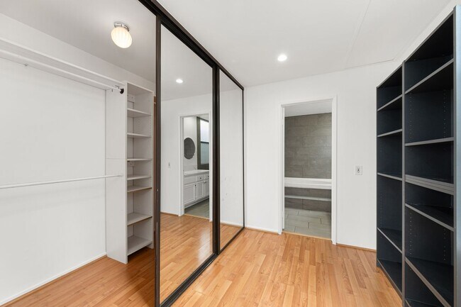 Primary en-suite view 5 - walk-in closet, with shelving and storage - 1745 S Bentley Ave