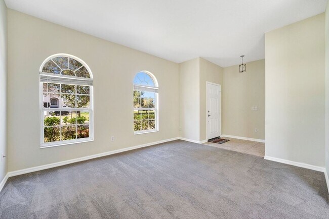 Building Photo - Cozy 4/2 Home Nestled in a Gated Community