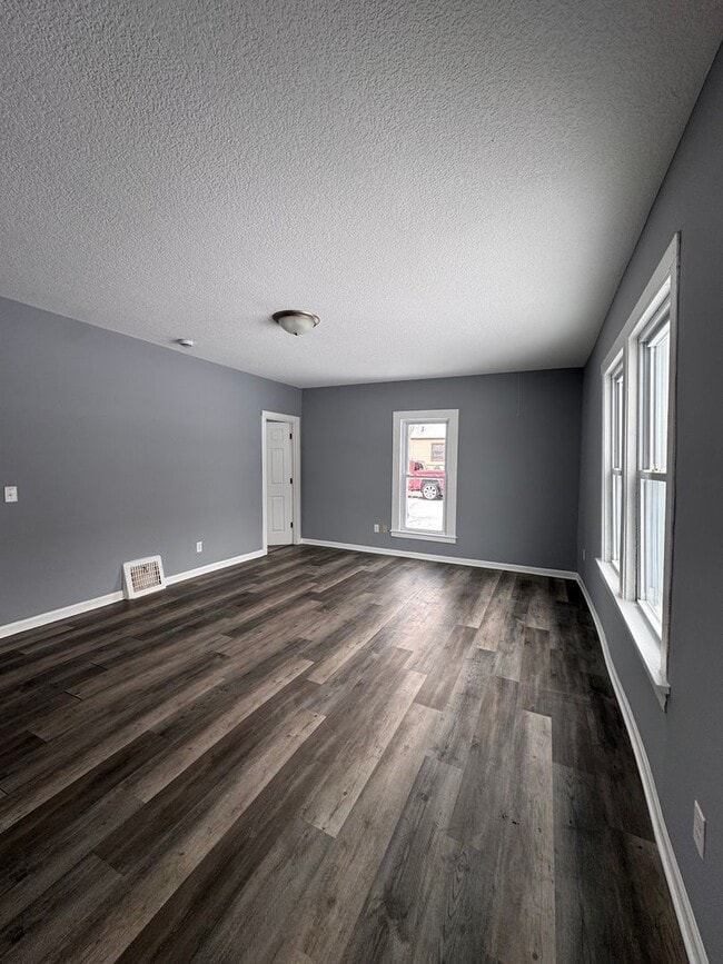 Building Photo - AVAILABLE NOW! Large 3 Bedroom, 2 Bathroom, with Extra Rooms and Two Car Garage in Anoka