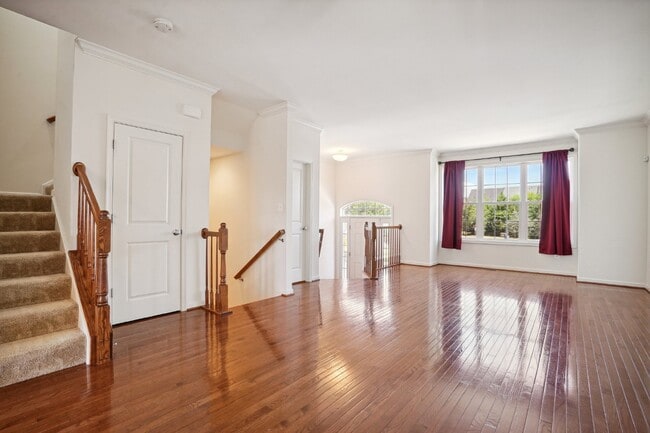 Building Photo - This beautiful townhome spans three finished levels and over 2800 square feet.