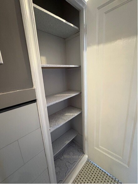 Great storage closet in bathroom - 7141 Tulane Ave