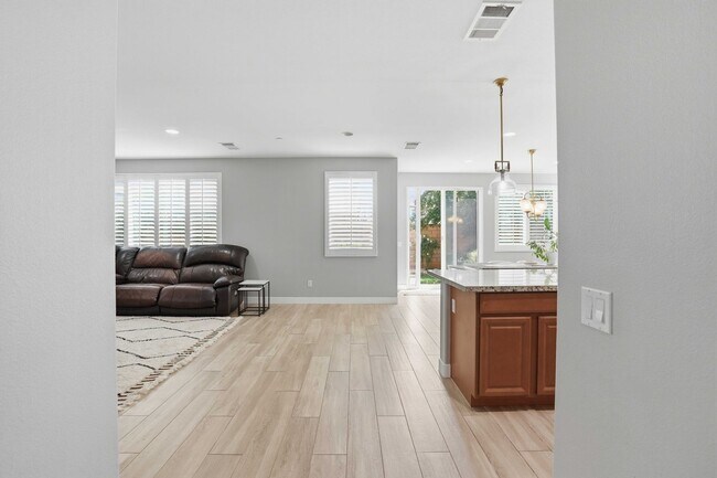 Building Photo - Highly Sought-After Next Gen Home with Private Downstairs Suite in Gated Valencia Community