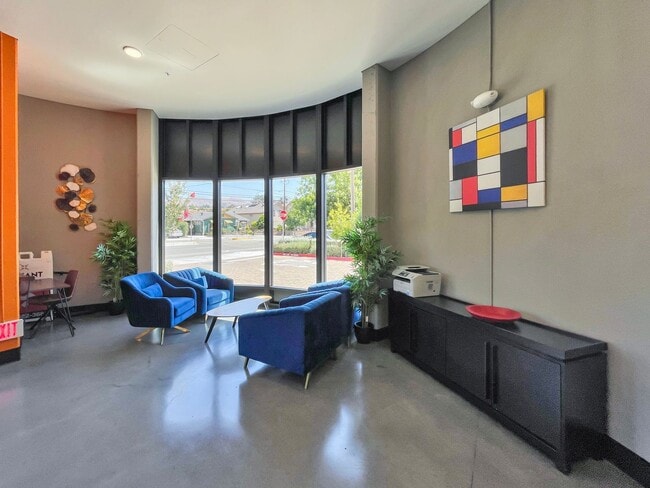 Building Photo - Modern 2BD Fremont Condo – EV Charger, Balcony, & Walk to BART