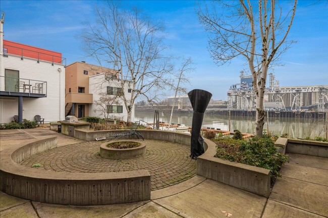 Building Photo - Newly Renovated condo with Stunning River ...