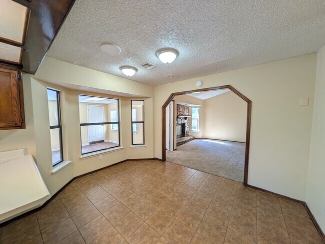 Building Photo - 1707 S 138th E Ave