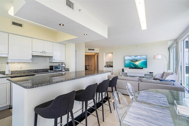 Building Photo - 4779 Collins Ave