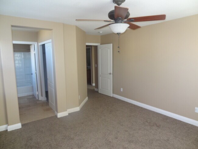 Building Photo - 3 Bedroom, 2 1/2 Bath Home With Attached Garage In A Gated Community
