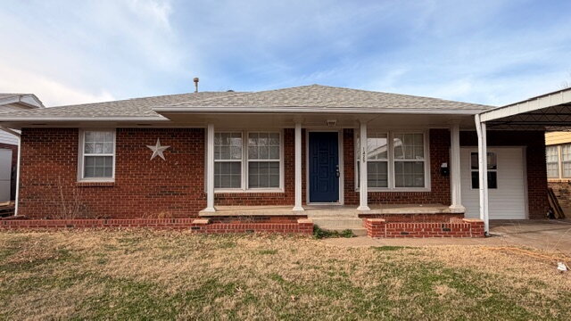 Building Photo - The Carport Cottage: Charming 3-Bedroom Brick Home Available Now.