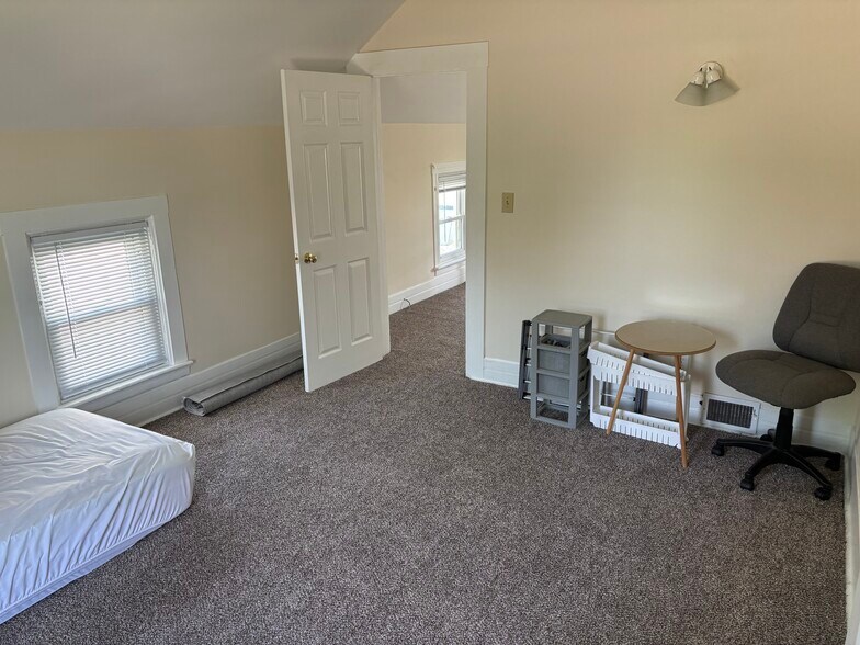 Large bedroom #1 upstairs. - 319 Garfield Ave