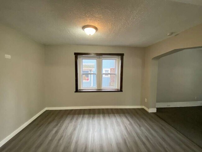 Building Photo - Move-In Special – $300 rent credit after 6 months of on-time payments!