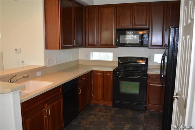 Building Photo - 8388 E 23rd Ave