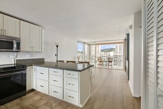 Building Photo - High floor, corner unit at Makiki Towers. Partially furnished, renovated 2-bedroom, 1.5 bathroom ...