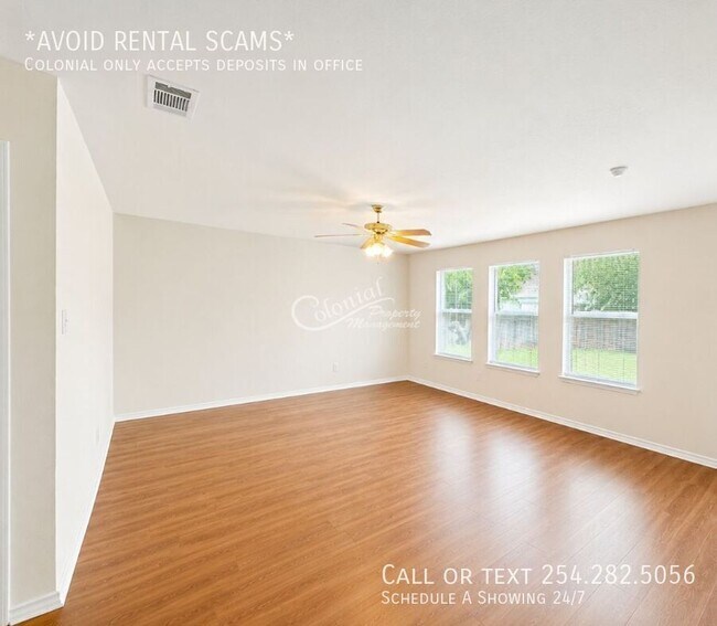 Building Photo - 5406 Boot Scootin Ct