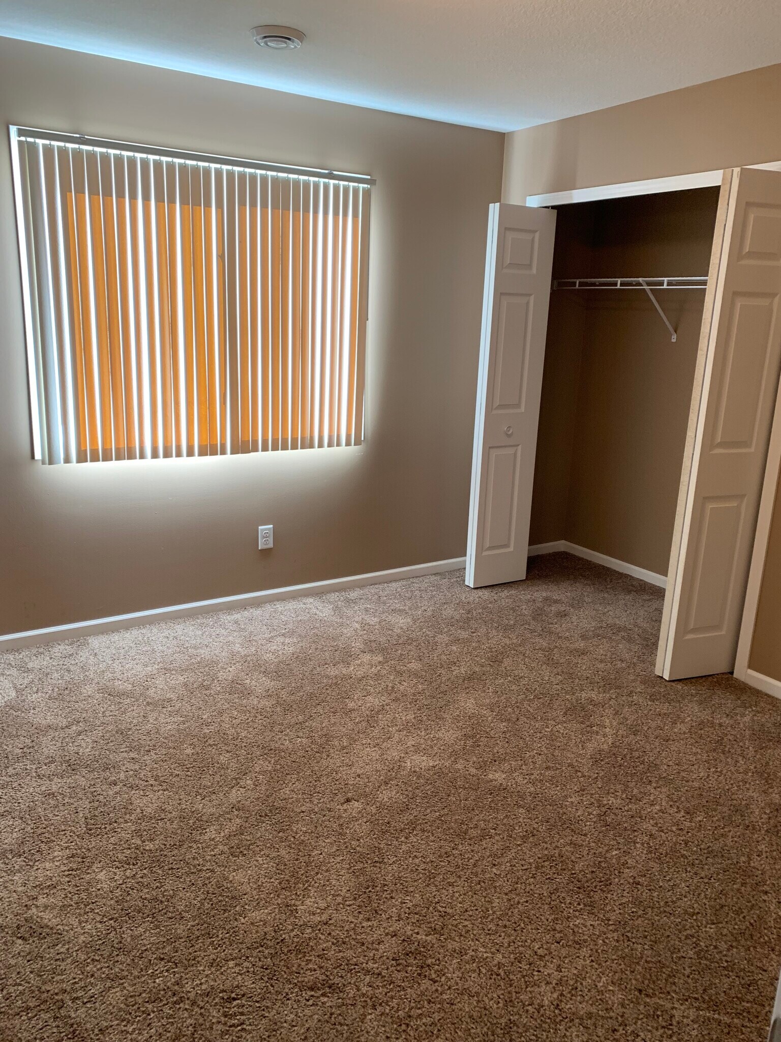 Bedroom one with large closet - 967 1st st se