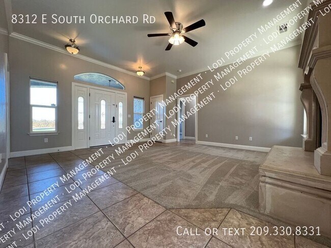 Building Photo - 8312 E Orchard Rd